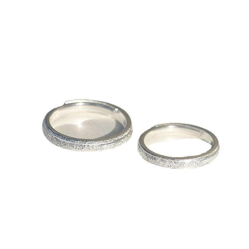 A Pair Of Silver Rings Are Simple