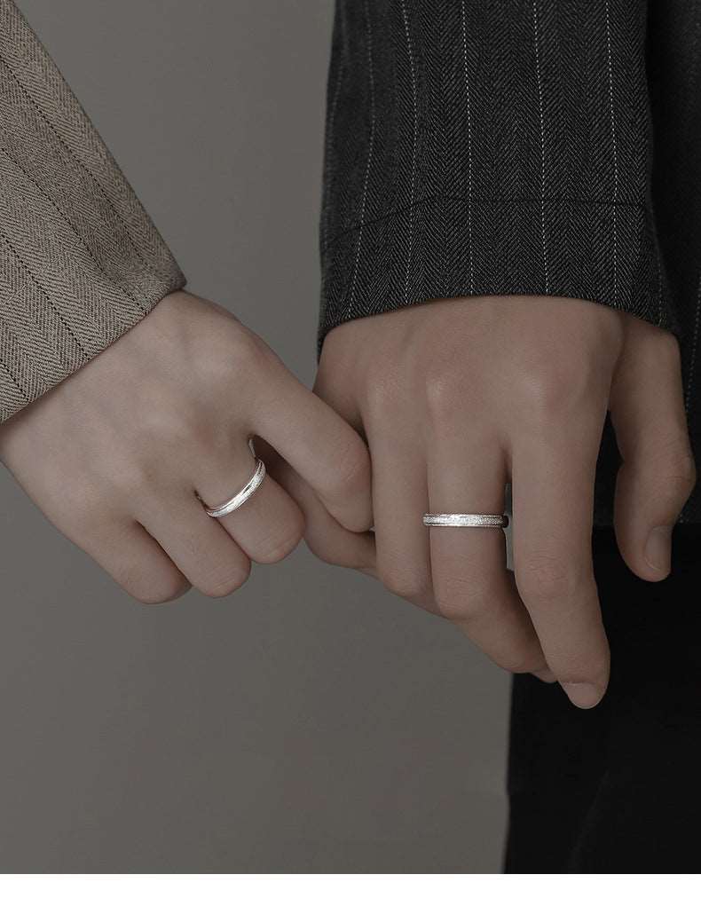 A Pair Of Silver Rings Are Simple